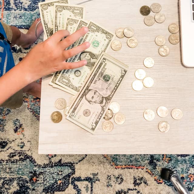 Child counting money