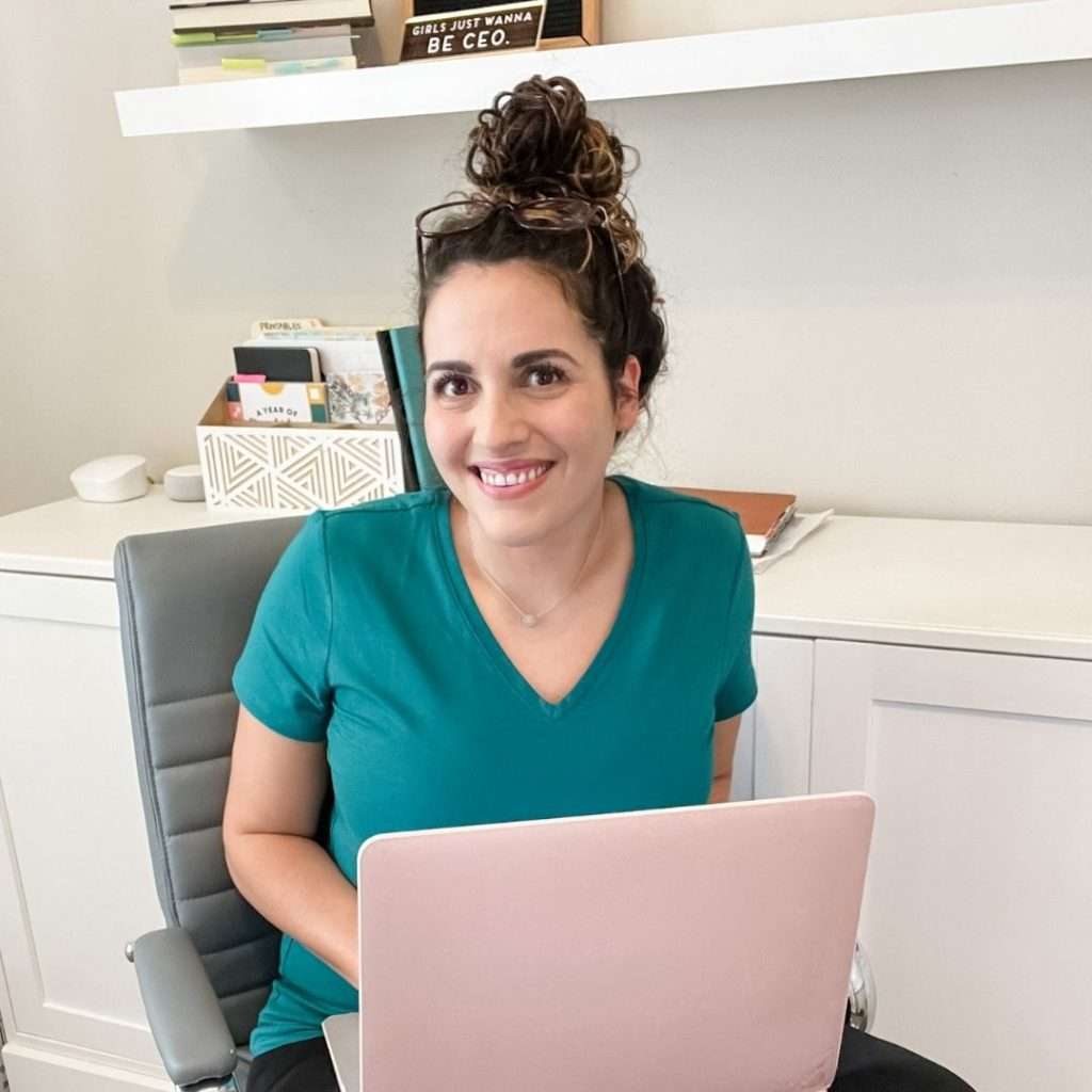 Allison Baggerly sitting with computer