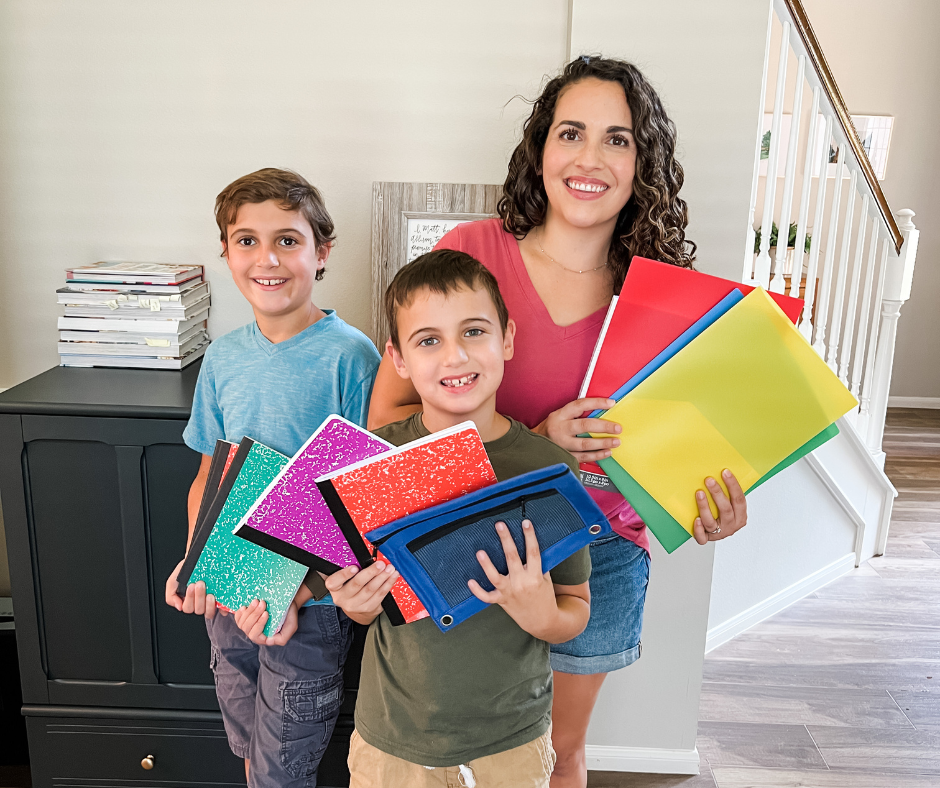 Mom with kids and school supplies