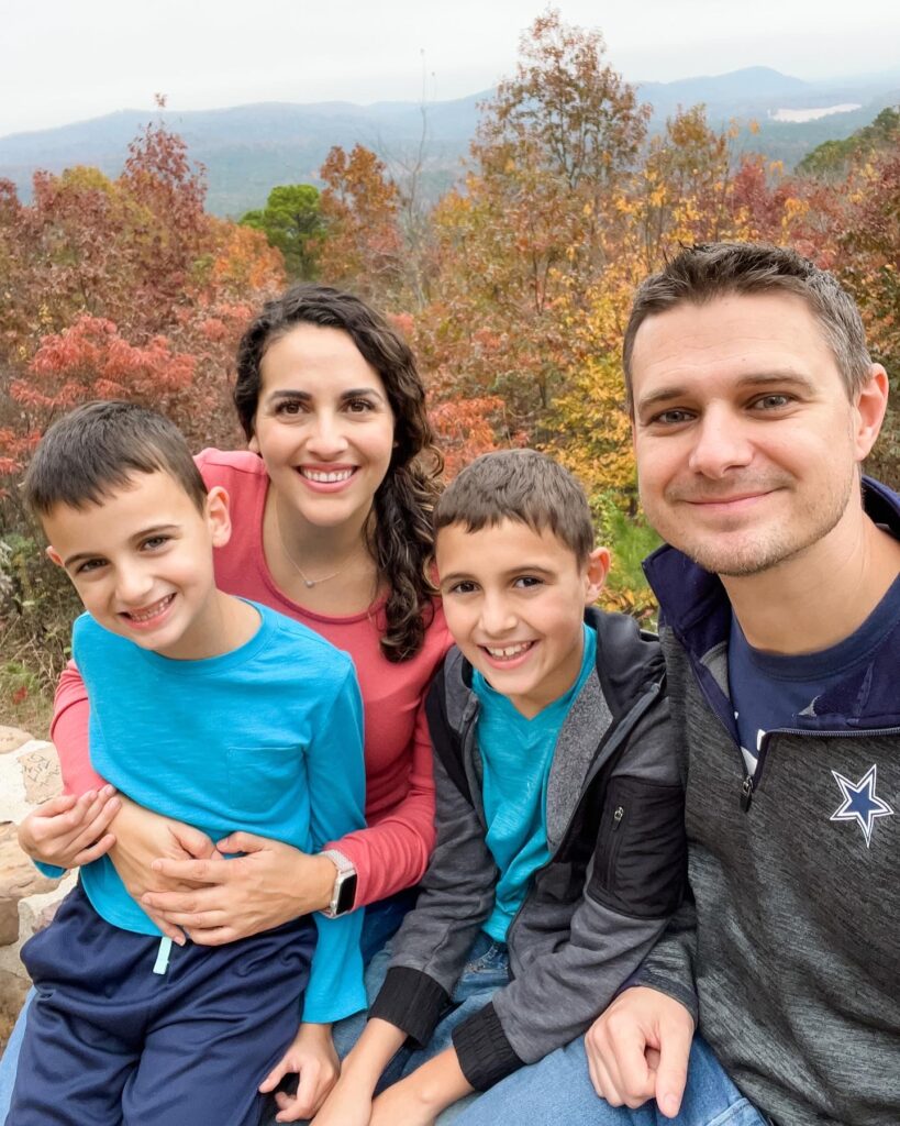 A family of four on a hike
